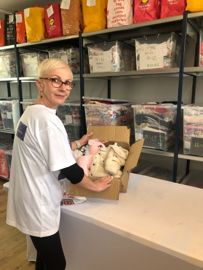 Zuzana Fratrikova, Chief Executive and Founder, helping at the Baby Bank