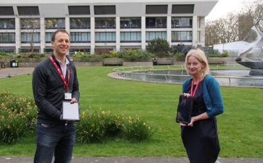 Dr Joel Mayer (left) and Prof Louise Rose (right) with tablets from the first delivery to support families, patients and clinical teams